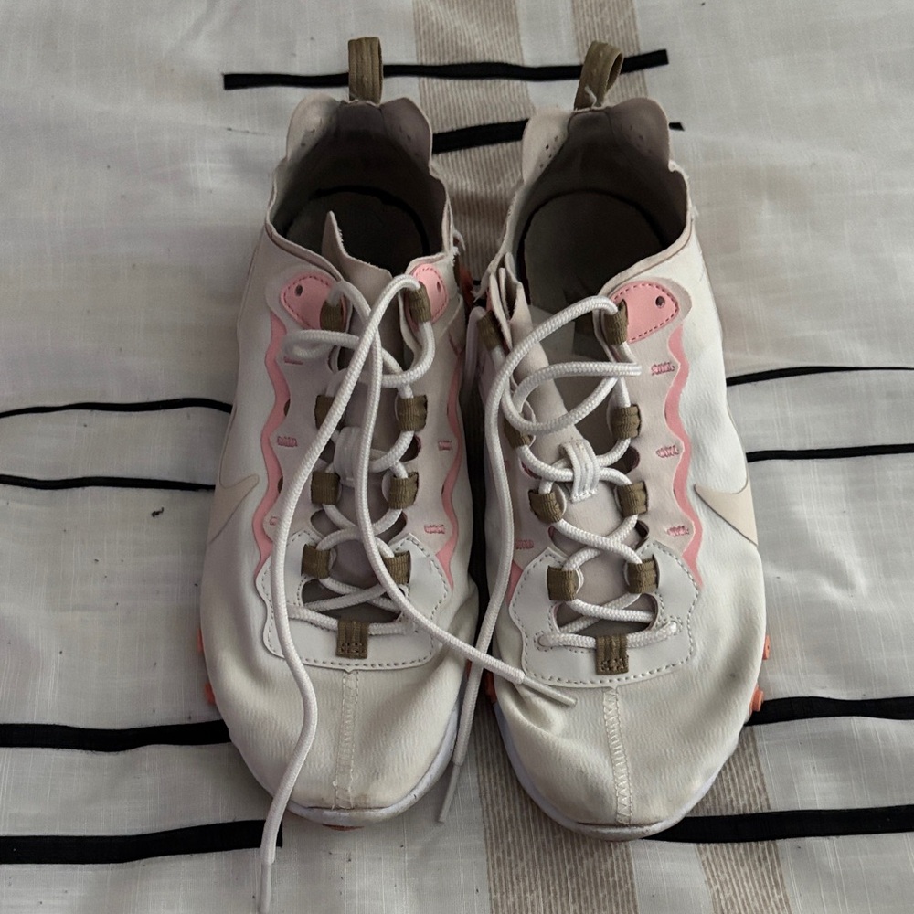 White and Pink Athletic Shoes